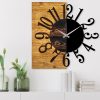 Elegáns dekoratív fa falióra, 58 x 3 x 58 cm | 100% fa és fém, csendes mechanizmus | Egyedi dió-fekete kivitel, bármilyen helyiségbe tökéletes
