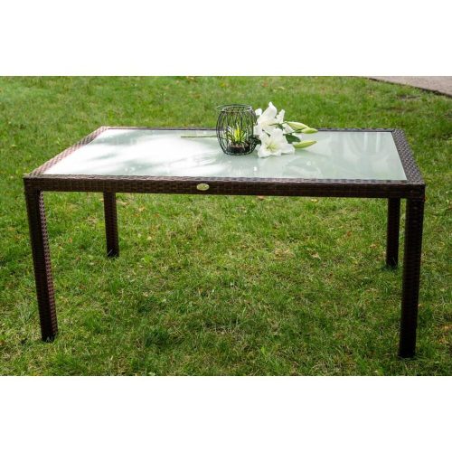 Asztal barna rattan borítással üveglappal 90*150*74 cm-es